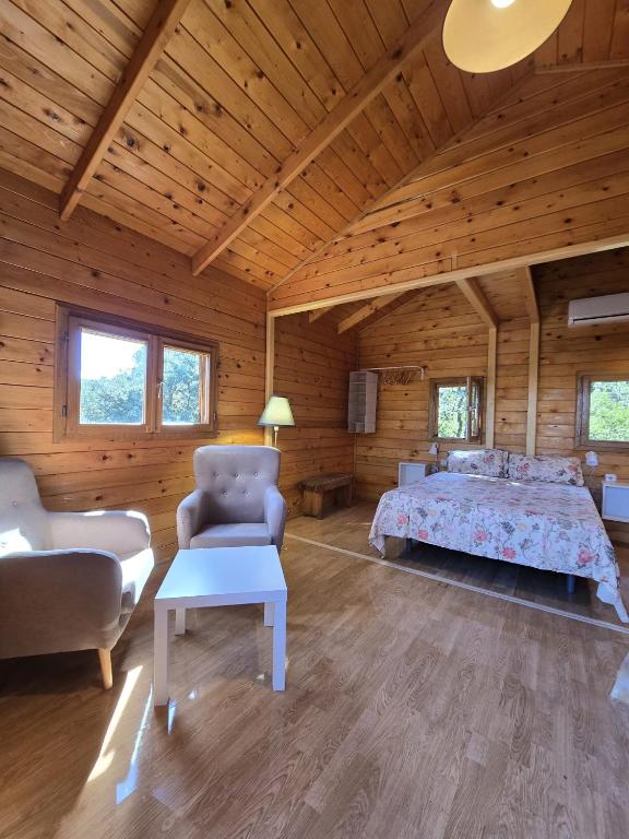Postel nebo postele na pokoji v ubytování Nuevo Ecolodge Cabañeros
