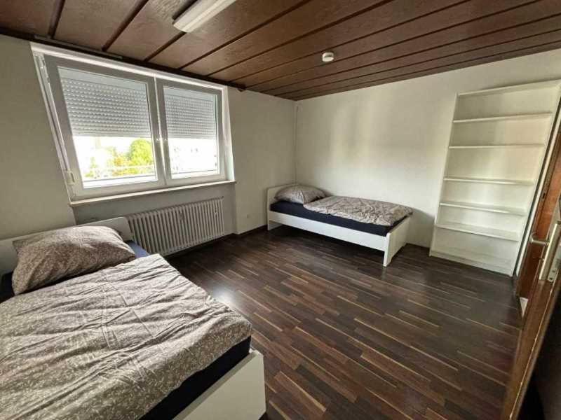 Postel nebo postele na pokoji v ubytování Penthouse Haar