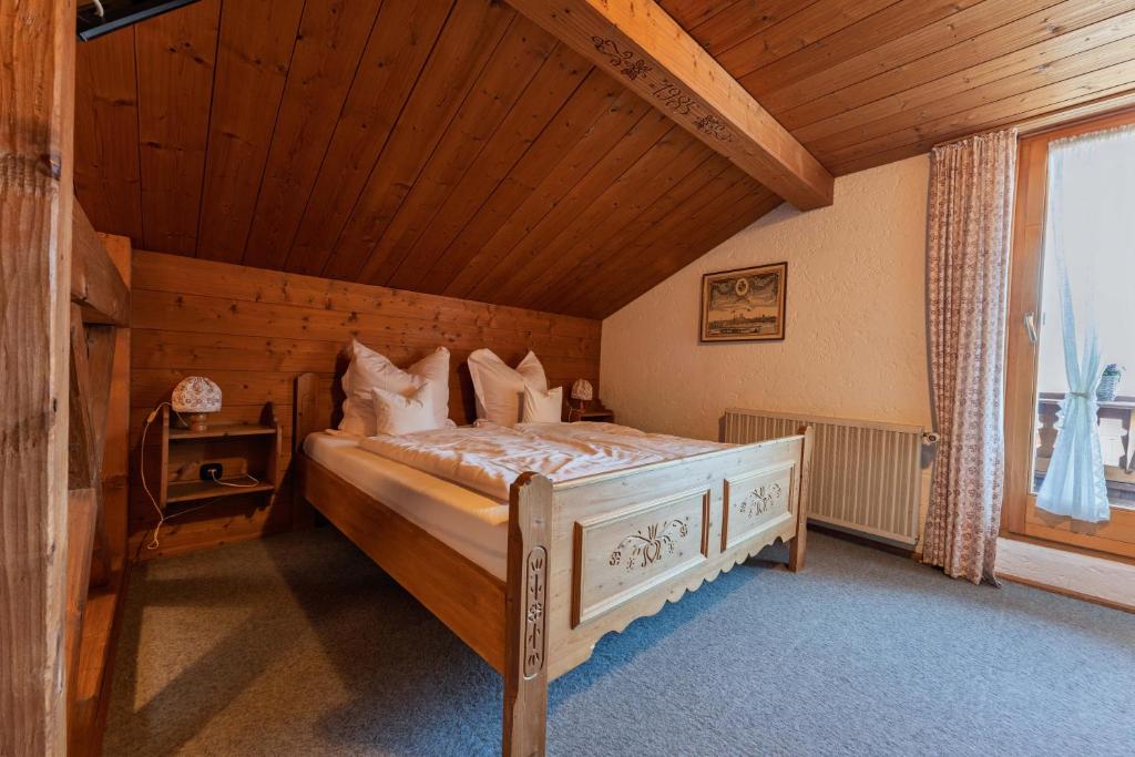 Postel nebo postele na pokoji v ubytování Ferienwohnungen Chiemgau