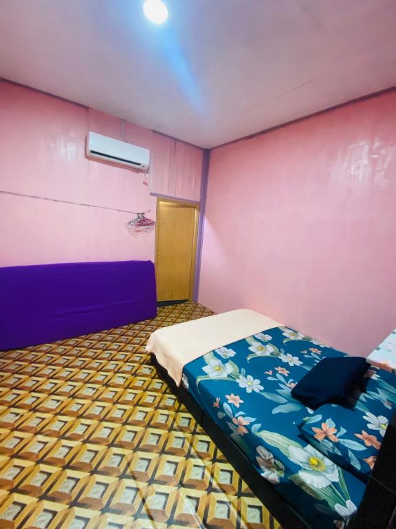 Postel nebo postele na pokoji v ubytování D perhentian