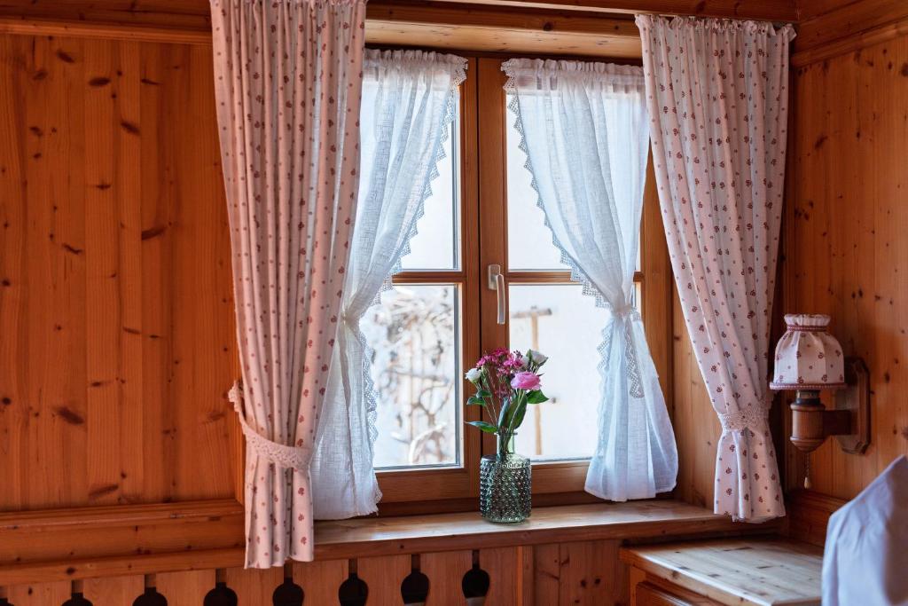 Postel nebo postele na pokoji v ubytování Ferienwohnungen Chiemgau