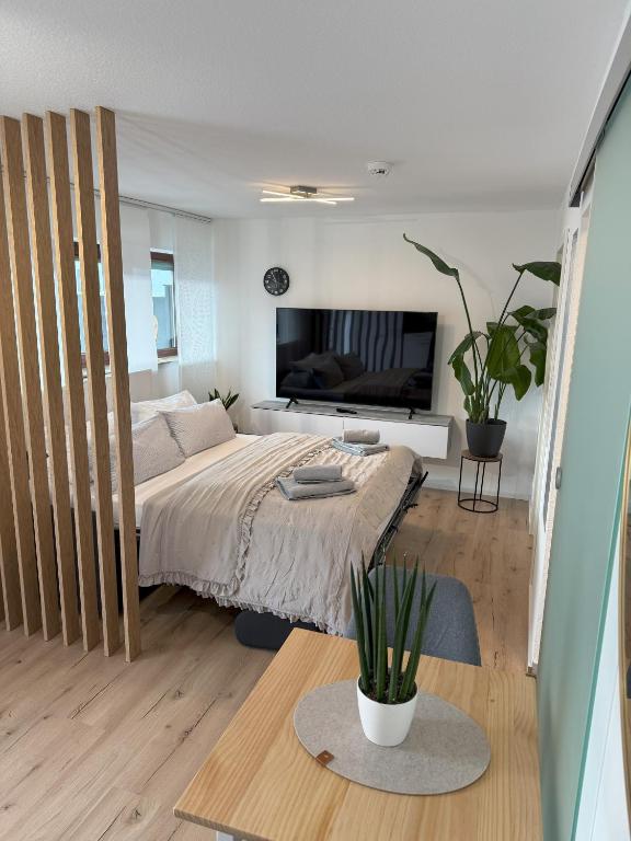 Postel nebo postele na pokoji v ubytování Das 1 Zimmer Apartment