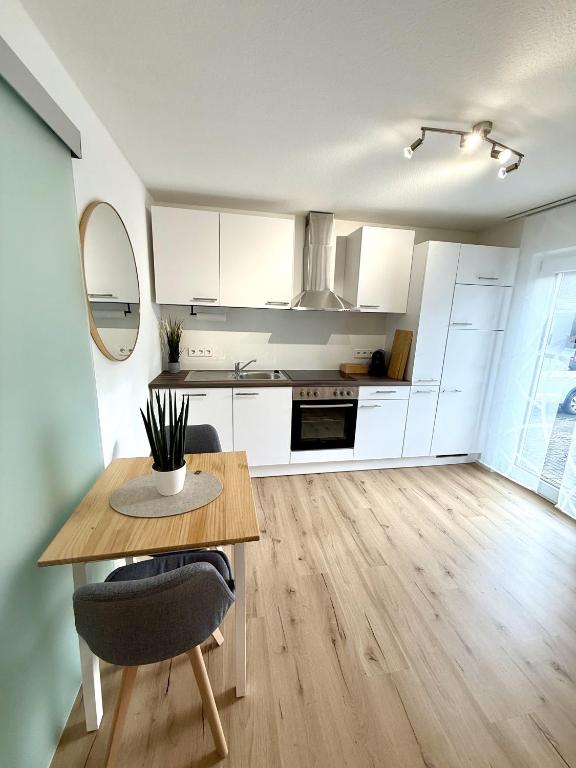 Kuchyň nebo kuchyňský kout v ubytování Das 1 Zimmer Apartment