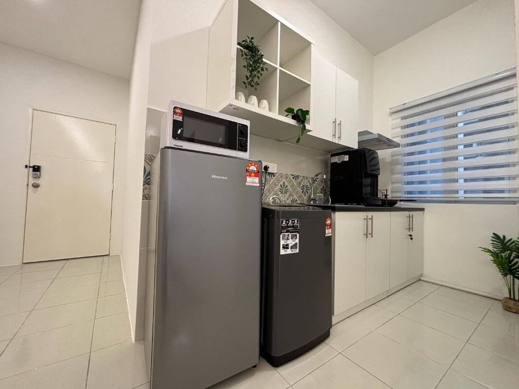 Kuchyň nebo kuchyňský kout v ubytování Ipoh Anderson Town Suites with 2 Parking by IWH