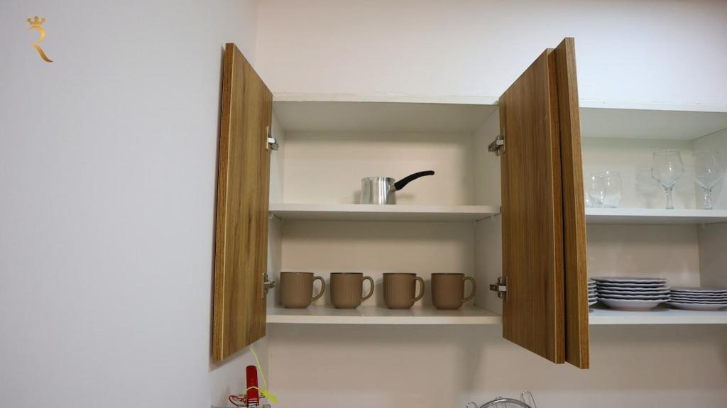 Kuchyň nebo kuchyňský kout v ubytování Cozy 2BR Masdar Pool Parking and Near Airport