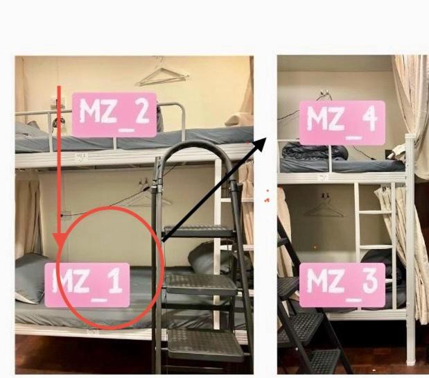 Postel nebo postele na pokoji v ubytování 阿霞袂睏MAMAzzzzHostel