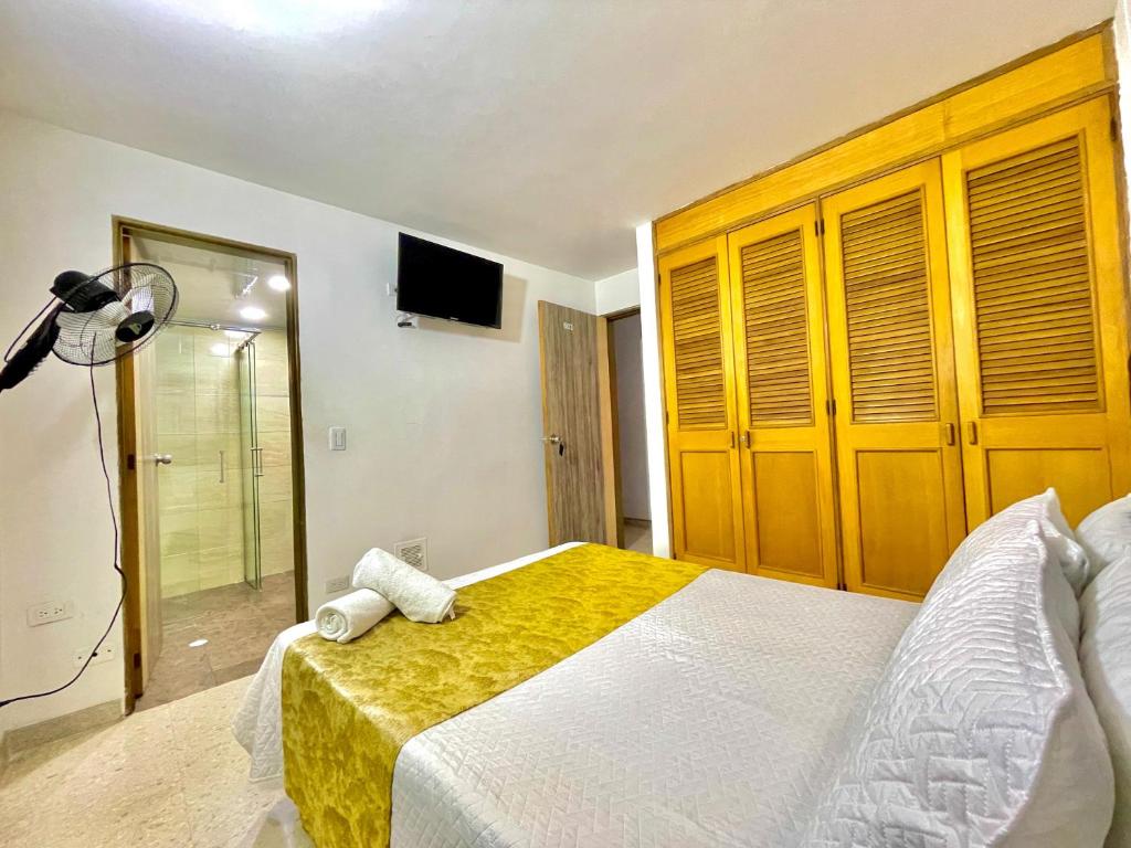 Postel nebo postele na pokoji v ubytování Hotel Torre Primavera