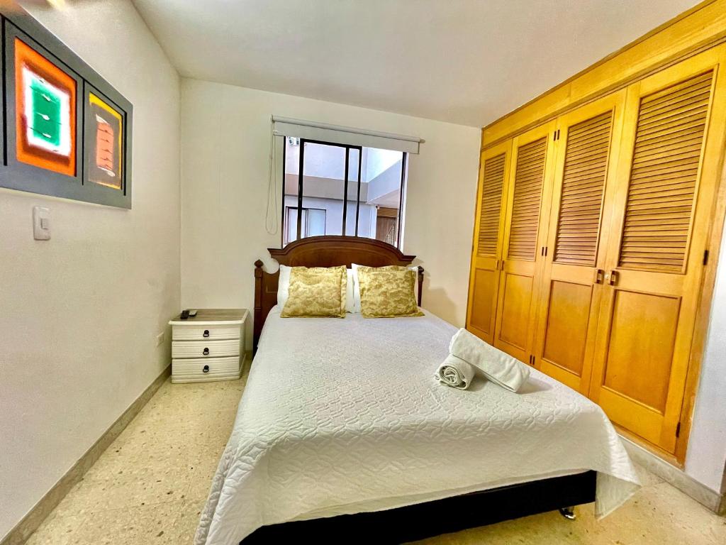 Postel nebo postele na pokoji v ubytování Hotel Torre Primavera