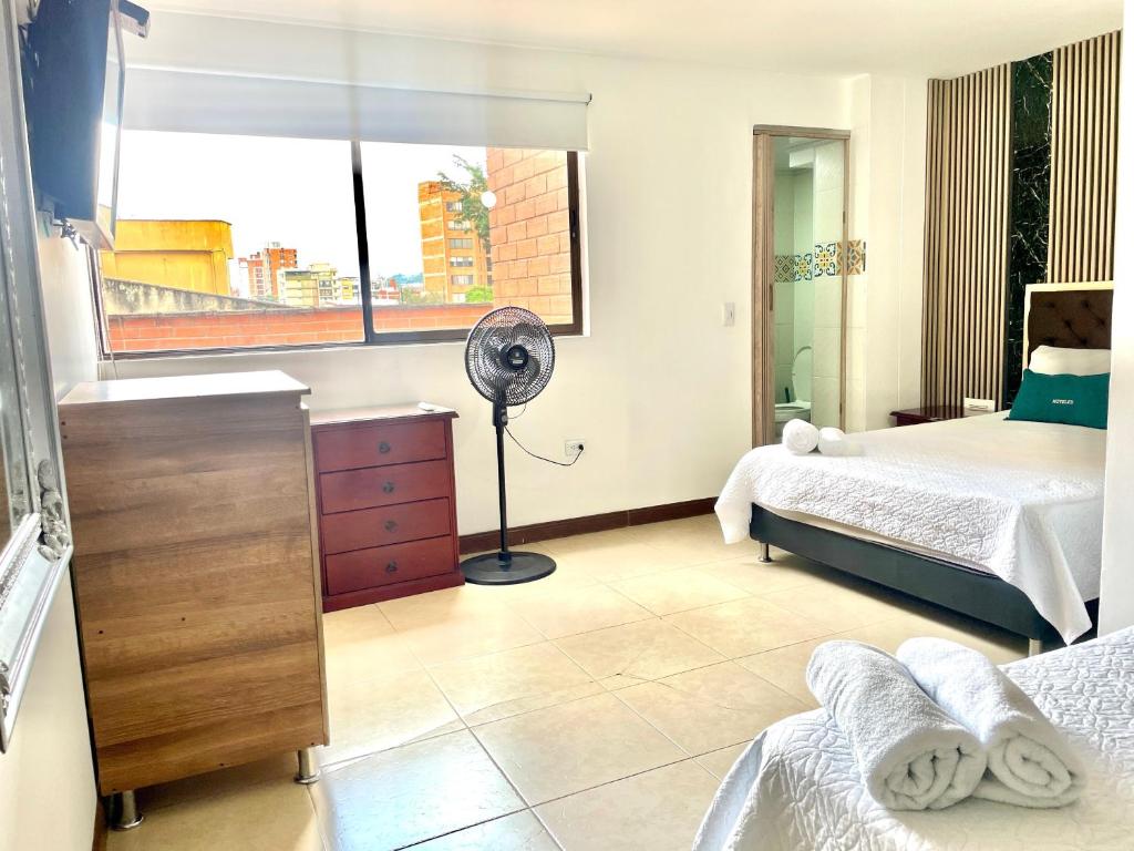 Postel nebo postele na pokoji v ubytování Hotel Torre Primavera
