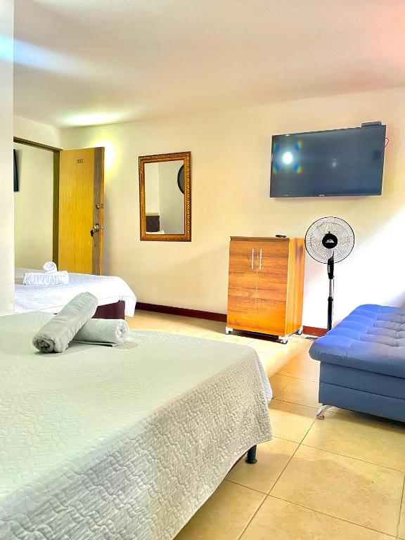 Postel nebo postele na pokoji v ubytování Hotel Torre Primavera
