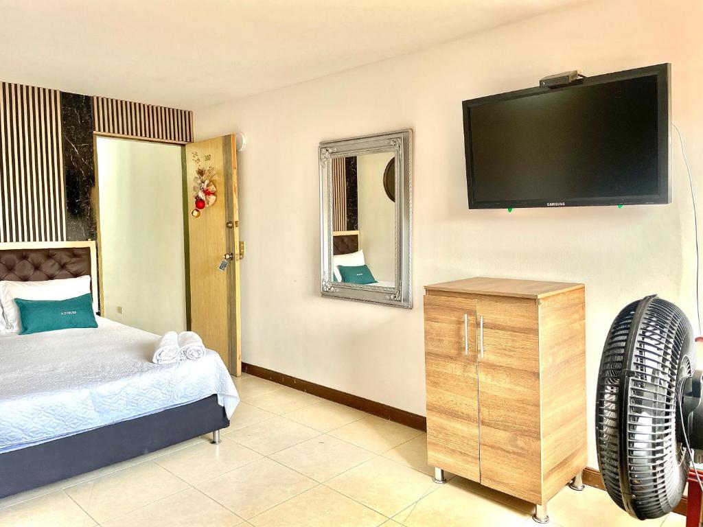 Postel nebo postele na pokoji v ubytování Hotel Torre Primavera
