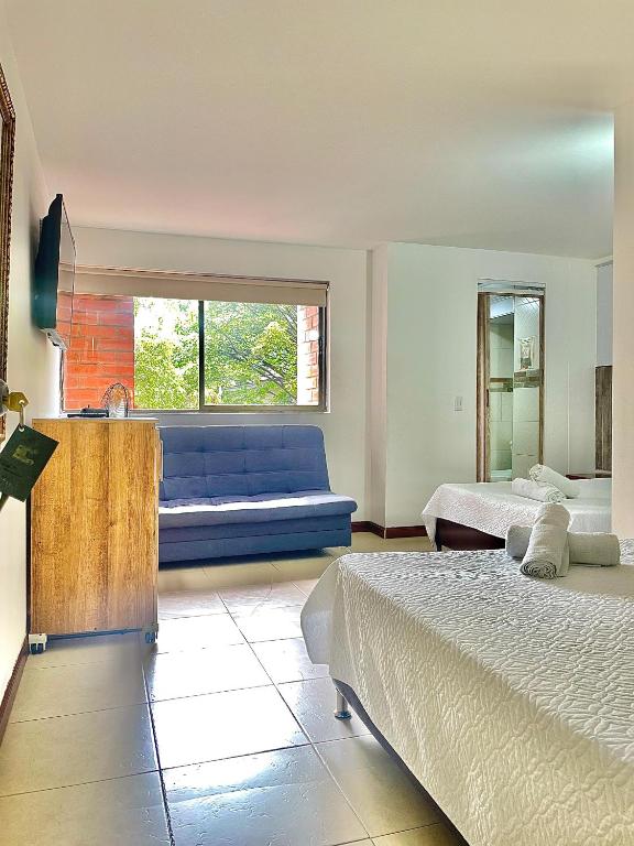 Postel nebo postele na pokoji v ubytování Hotel Torre Primavera