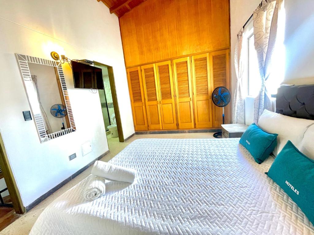 Postel nebo postele na pokoji v ubytování Hotel Torre Primavera