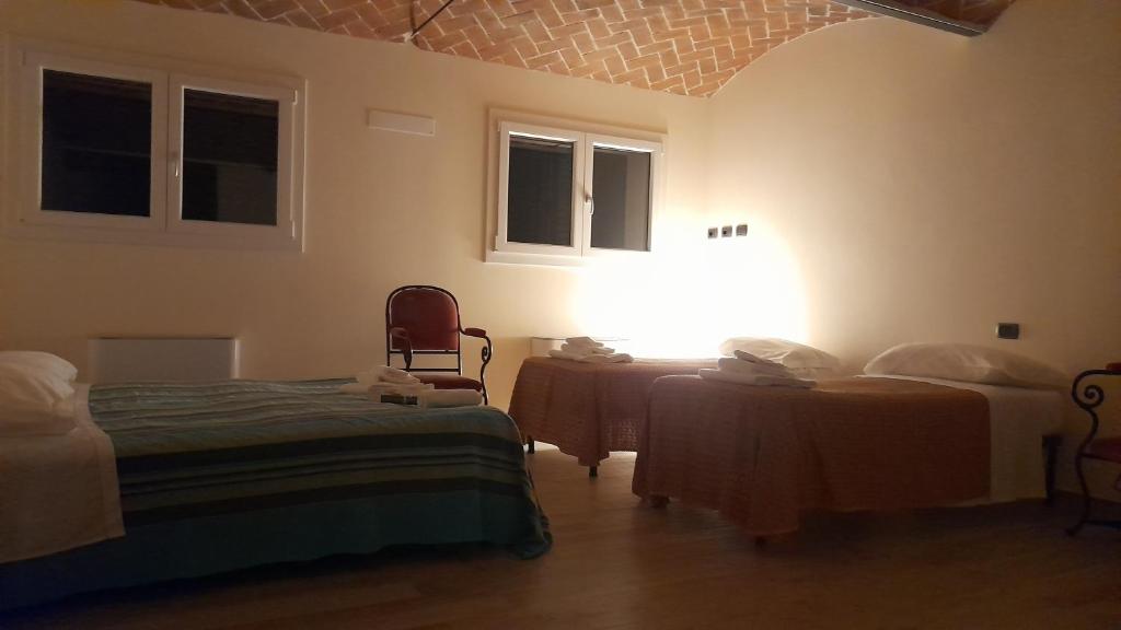 Postel nebo postele na pokoji v ubytování B&B Casa Pascolone