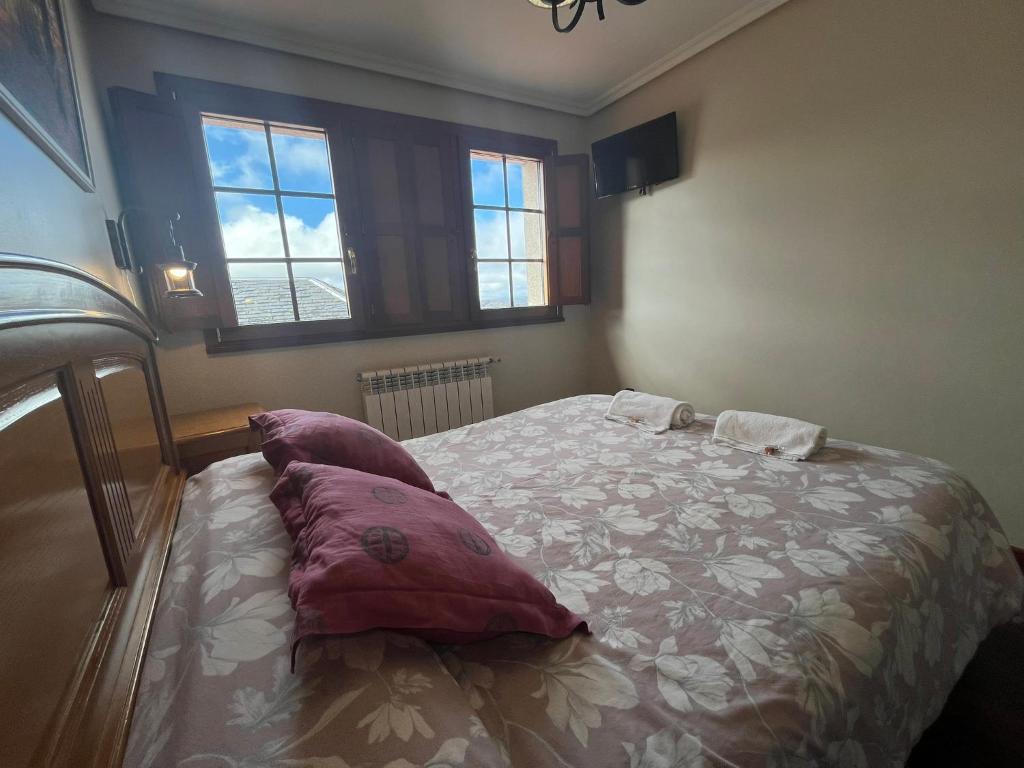 Posteľ alebo postele v izbe v ubytovaní Hotel Casa Alberto