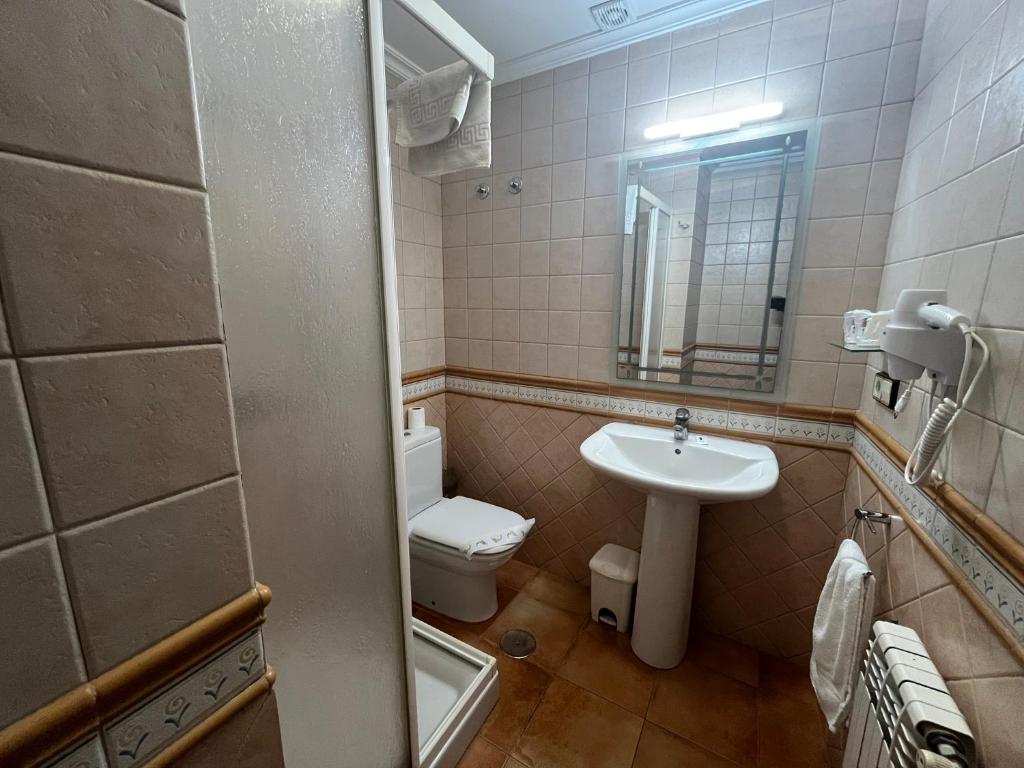 Kúpeľňa v ubytovaní Hotel Casa Alberto
