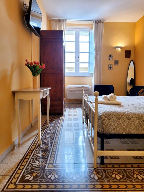 Postel nebo postele na pokoji v ubytování Residenza FillAnfi