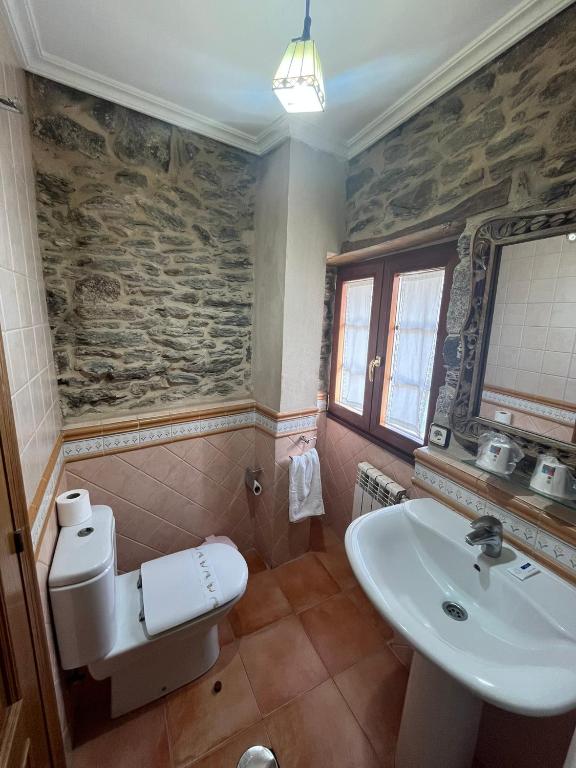 Kúpeľňa v ubytovaní Hotel Casa Alberto
