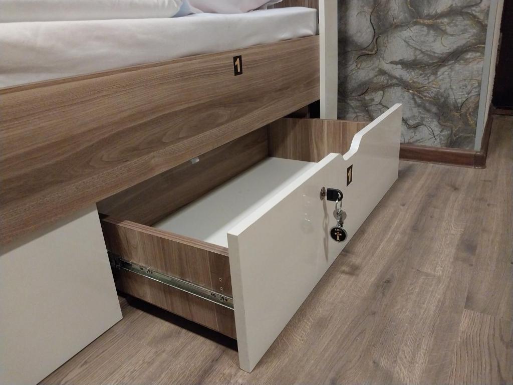 Postel nebo postele na pokoji v ubytování KING Hostel Center