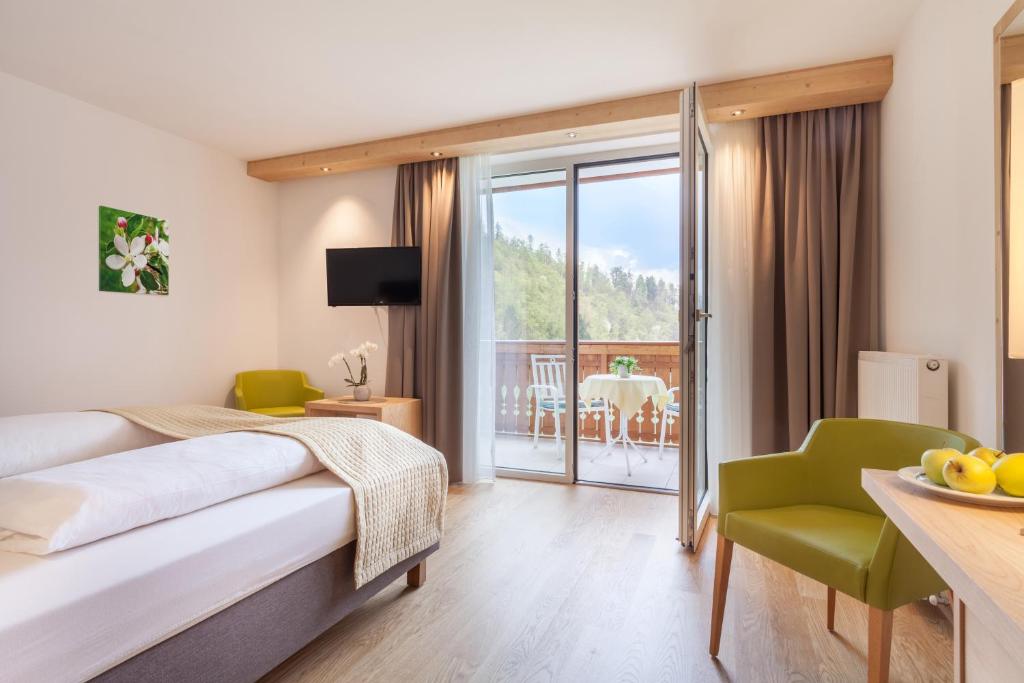 Postel nebo postele na pokoji v ubytování Hotel Kiendl