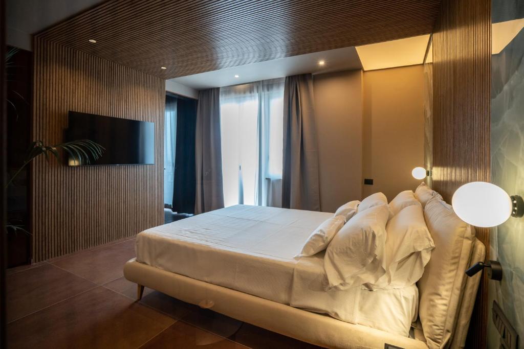 Letto o letti in una camera di Le Dimore - Ponte 7