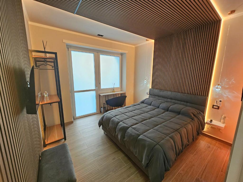 Postel nebo postele na pokoji v ubytování Borghese Affittacamere suite inalpi arena