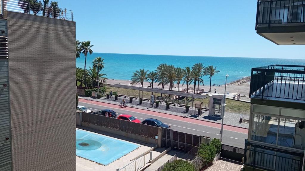 a view of the beach from a balcony of a building at Mediterraneo-Chic 120 in Benicàssim