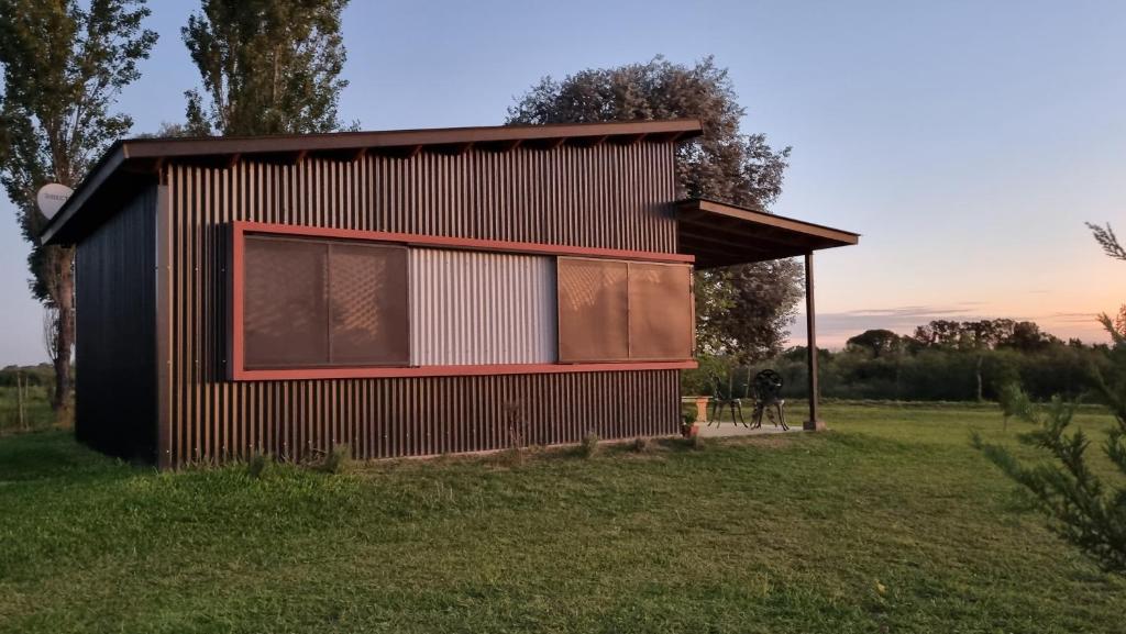 a rendering of a small house in a field at Almada - Casas de Campo in Baradero