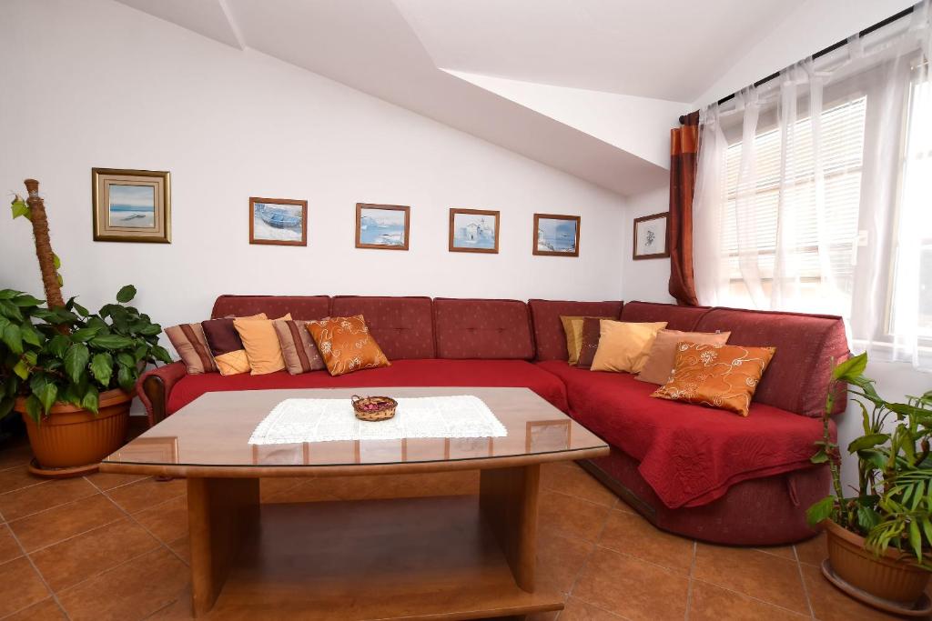 Posezení v ubytování Apartment and Rooms Artina