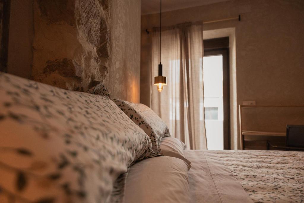 Ένα ή περισσότερα κρεβάτια σε δωμάτιο στο Bonita Burell Boutique