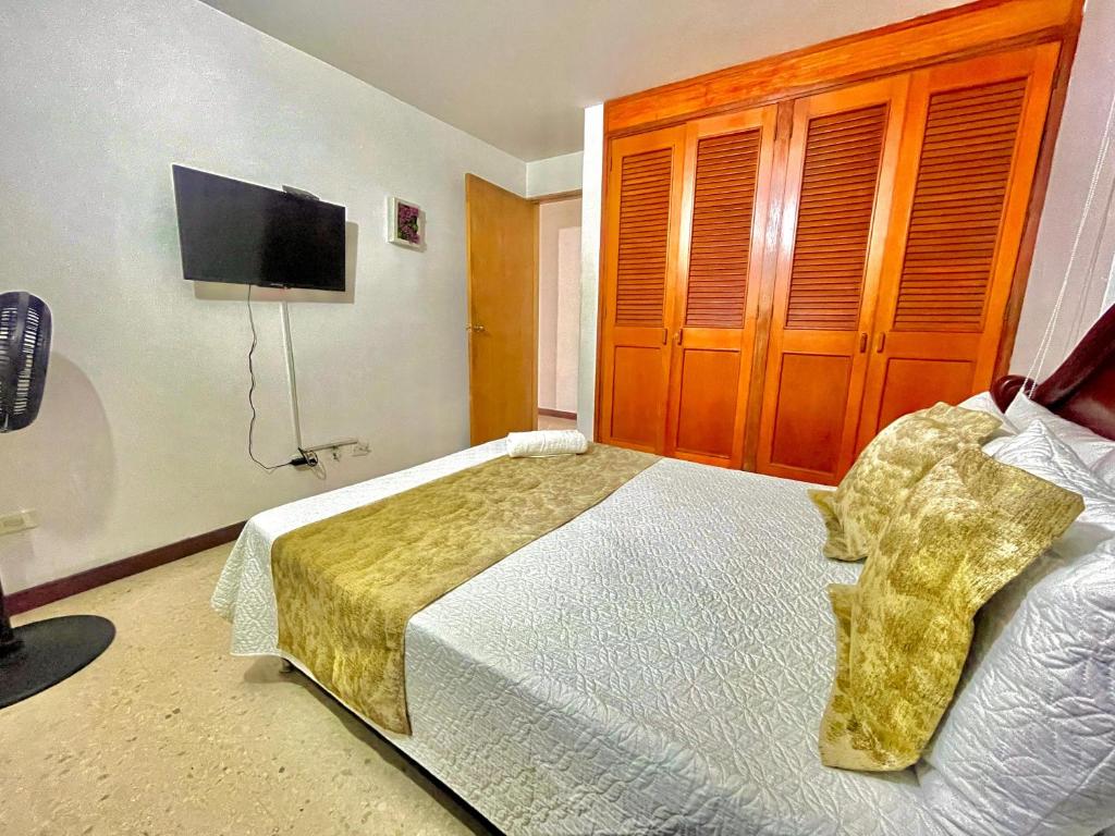 Postel nebo postele na pokoji v ubytování Hotel Torre Primavera