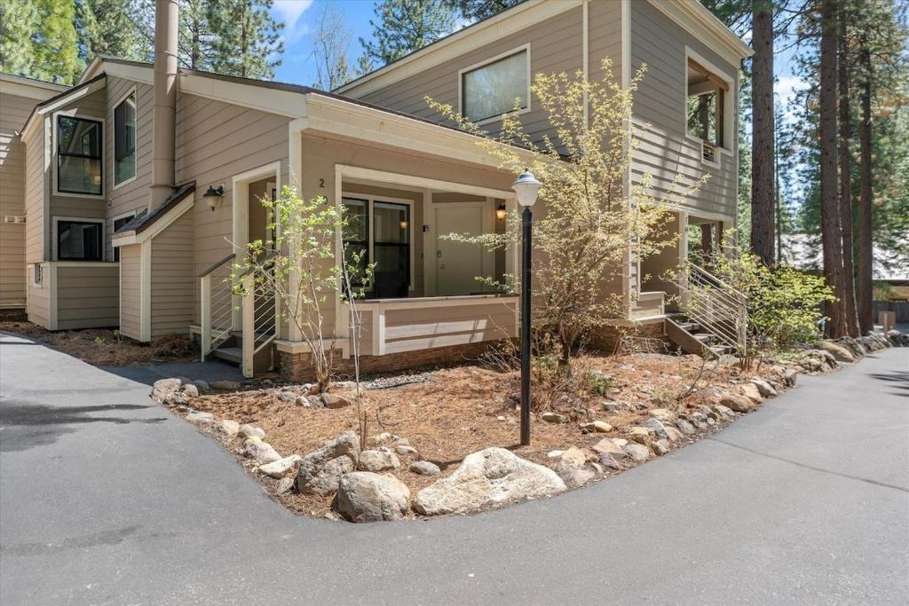 a house with a street light in front of it at Raccoon Roost condo in Incline Village