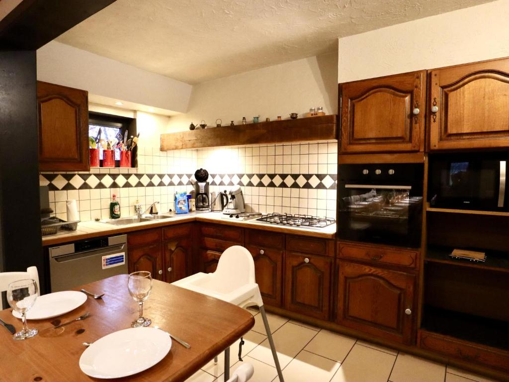 Kuchyň nebo kuchyňský kout v ubytování Tchénas