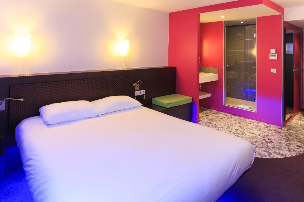 Postel nebo postele na pokoji v ubytování ibis Styles Lorient Caudan