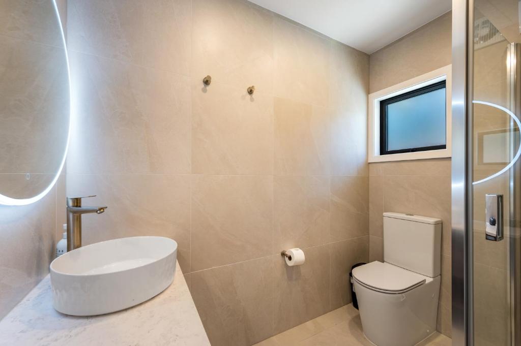 Koupelna v ubytování Luxe Suites & Apartments