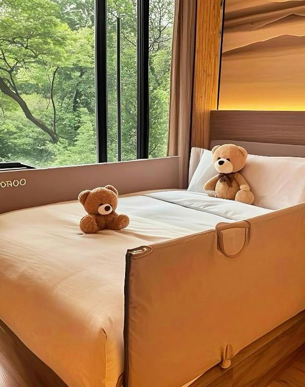 Postel nebo postele na pokoji v ubytování Wenzhou wumajie all-weather hotel shamao river branch - located in the city center pedestrian street with breakfast coffee afternoon tea free laundry drying service free gym free daily necessities free wifi tourist attractions hotel recommendation