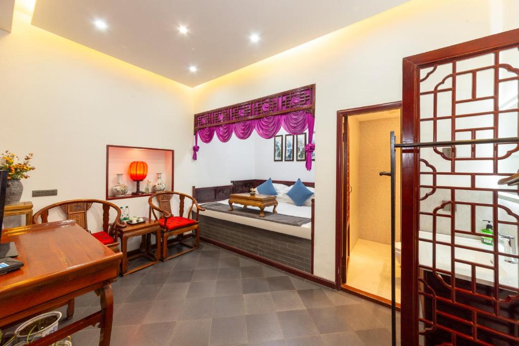 Kuchyň nebo kuchyňský kout v ubytování Pingyao Harmony Hotel