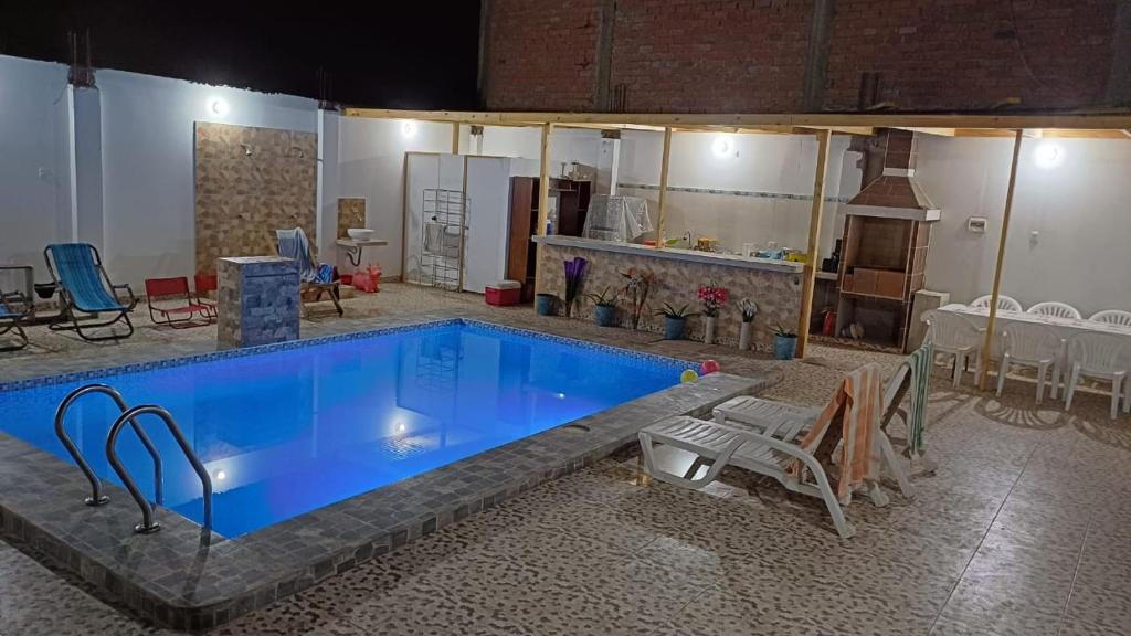 Bazén v ubytování Hospedaje Los Lobos nebo v jeho okolí