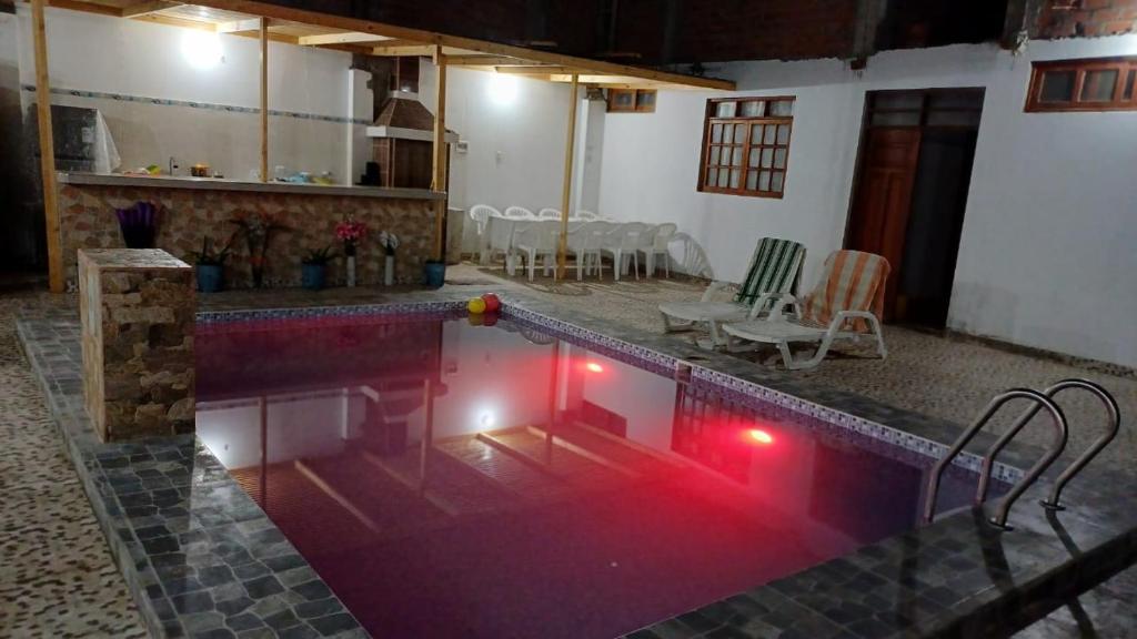Bazén v ubytování Hospedaje Los Lobos nebo v jeho okolí