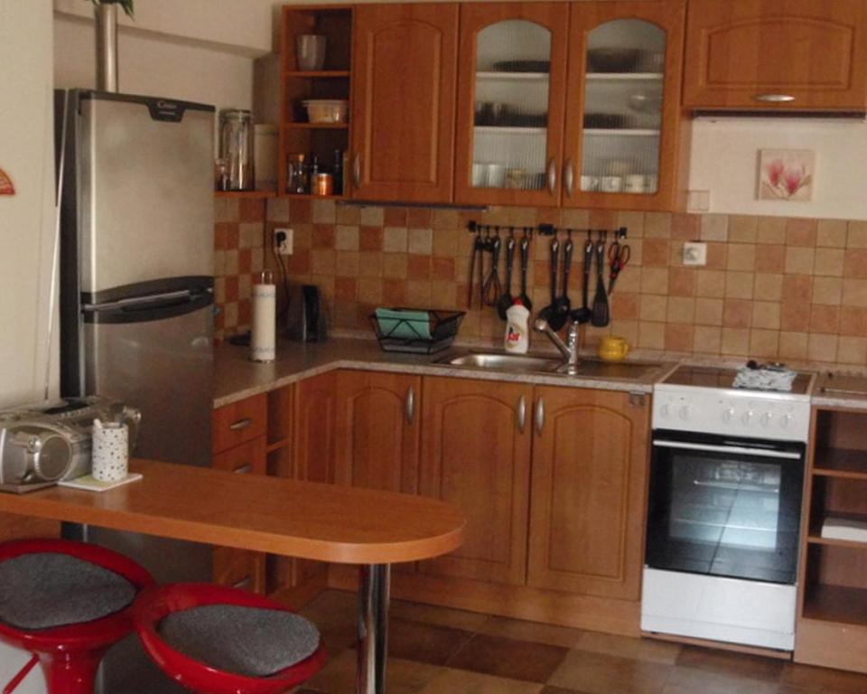 Kuchyň nebo kuchyňský kout v ubytování Apartman75