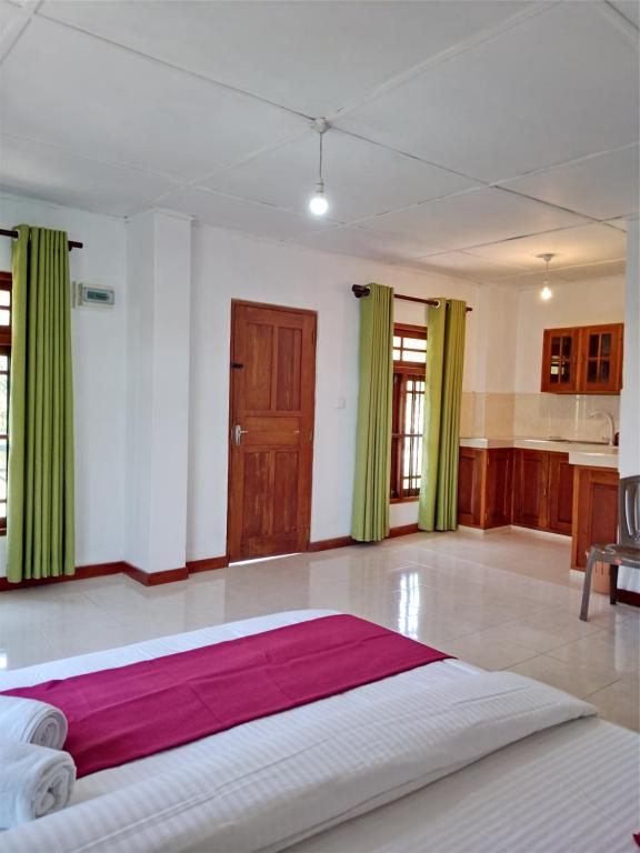 Postel nebo postele na pokoji v ubytování Ceyonra Evermist Residence