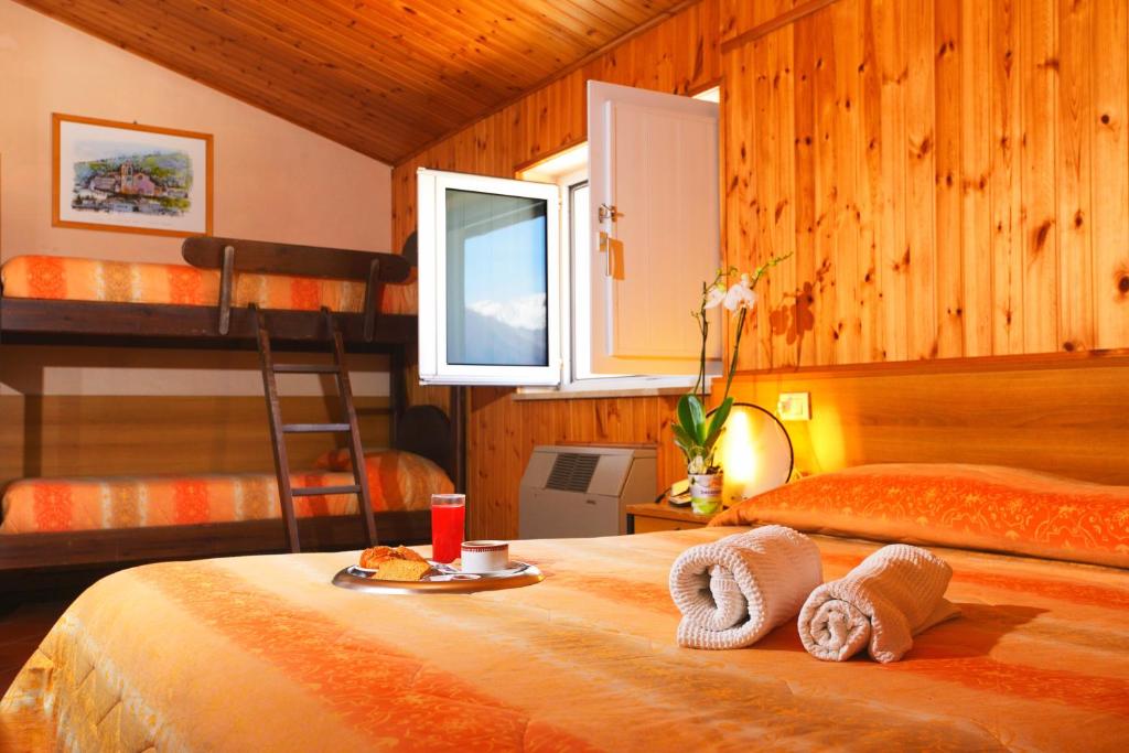 Katil atau katil-katil dalam bilik di Hotel Holidays