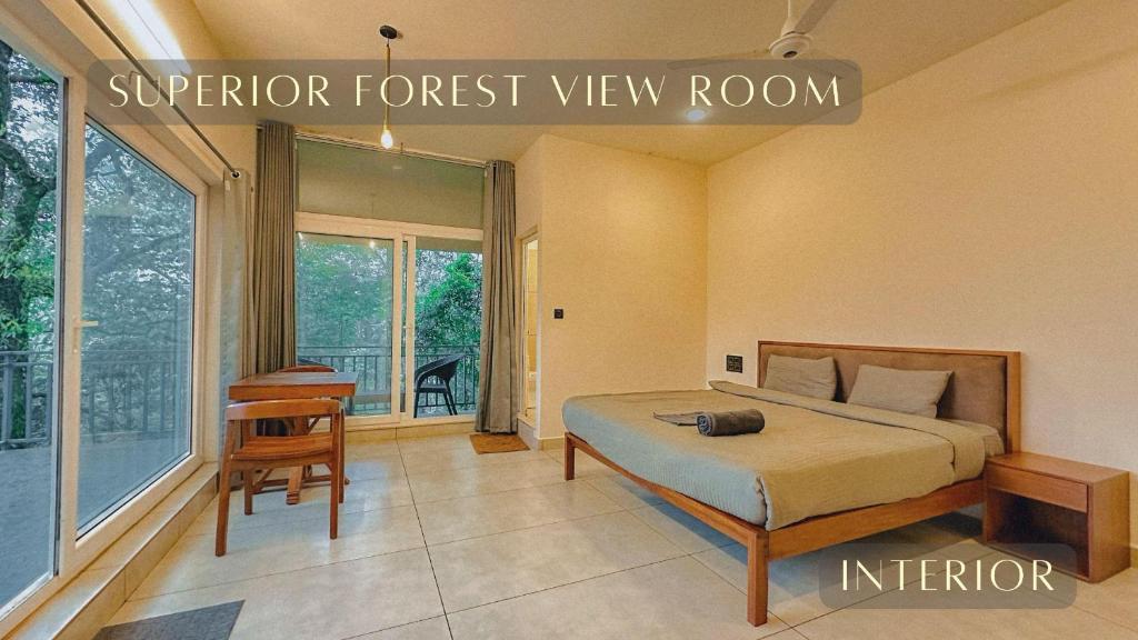 Postel nebo postele na pokoji v ubytování Forestscape Resort Munnar