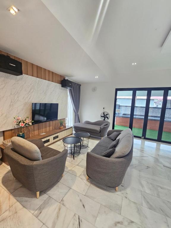 TV a/nebo společenská místnost v ubytování Melody Whole Or Suite Room