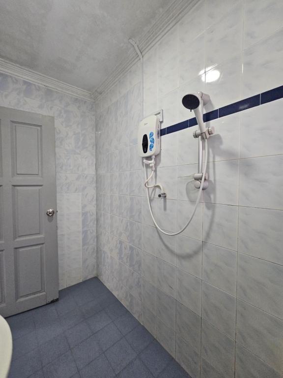 Koupelna v ubytování Melody Whole Or Suite Room
