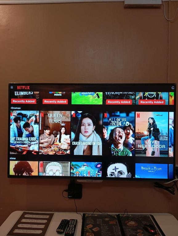 TV a/nebo společenská místnost v ubytování Ladolcevita Inland Resort