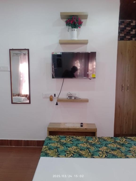 TV a/nebo společenská místnost v ubytování Amazing Homestay