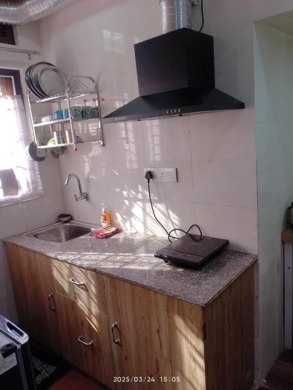 Kuchyň nebo kuchyňský kout v ubytování Amazing Homestay