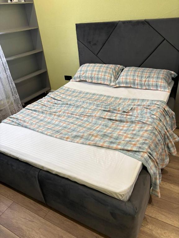 Postel nebo postele na pokoji v ubytování Суточная аренда