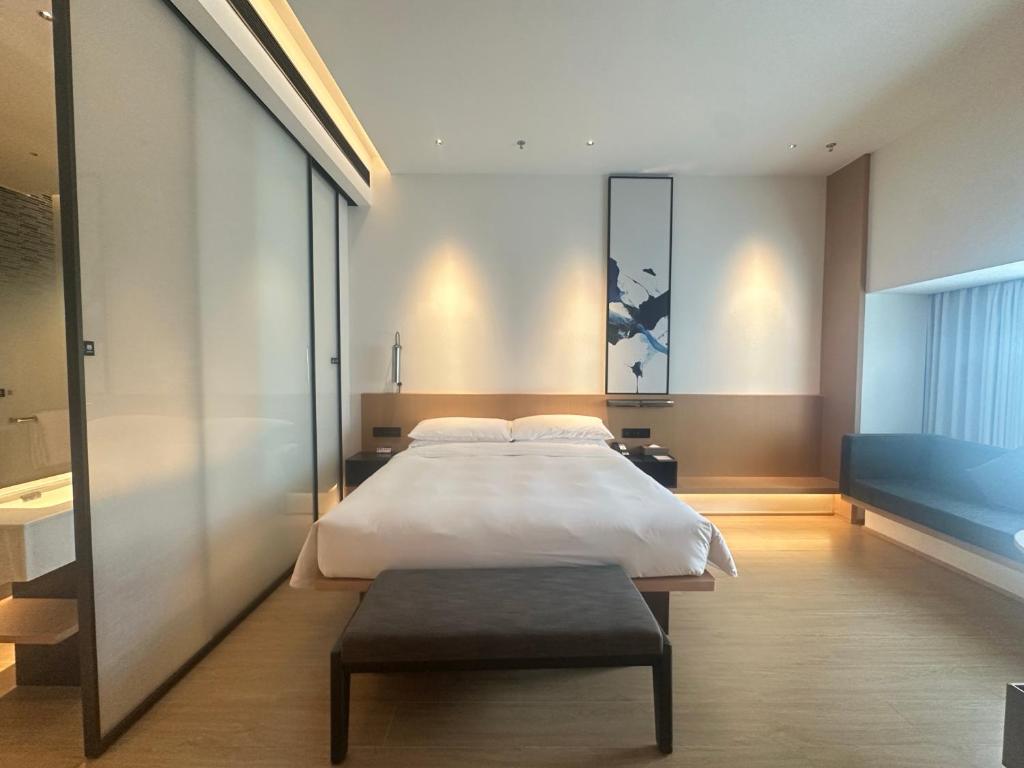 Postel nebo postele na pokoji v ubytování Fairfield by Marriott Quanzhou Fengze